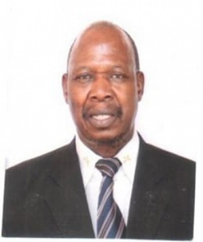 Prof. George Matomola Mulomboi– (PGD, MBA, LL, PhD, DBA, ACIB, FCIB, FZIB)